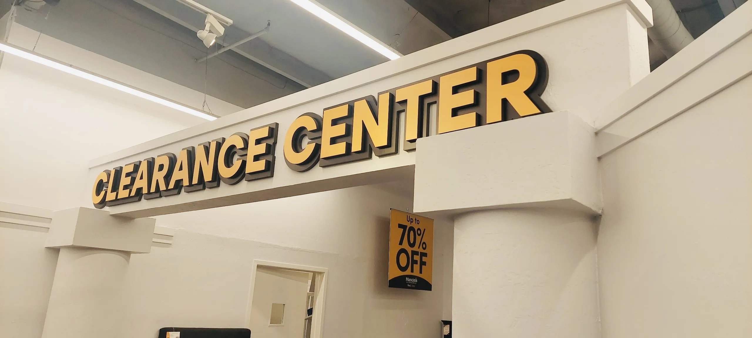 Mancini’s Sleepworld Clearance Center close-up two-layer dimensional letters construction — Clear Line Signs