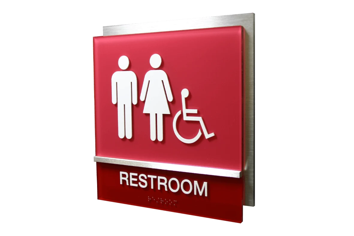 ADA-compliant acrylic room sign with Braille and tactile characters in a San Jose office corridor